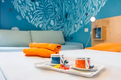 Letto o letti in una camera di La Terrazza Sul Porto