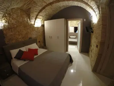 Letto o letti in una camera di Al Castello