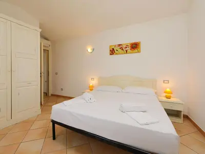 Letto o letti in una camera di Holiday Home Ville San Pietro - REI355 by Interhome