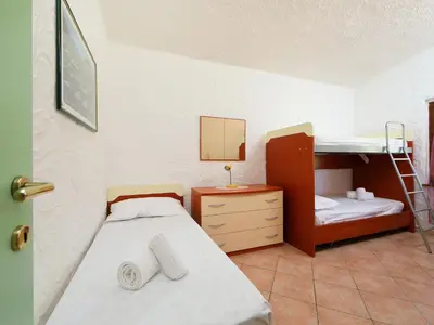 Letto o letti in una camera di Holiday Home Mirto Marino - REI410 by Interhome