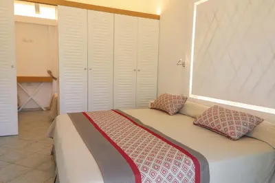 Letto o letti in una camera di Limone Beach Resort