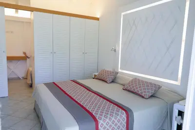 Letto o letti in una camera di Limone Beach Resort