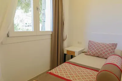Letto o letti in una camera di Limone Beach Resort