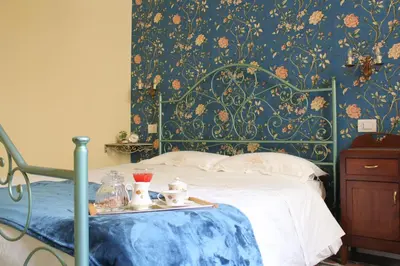 Letto o letti in una camera di Jacaranda
