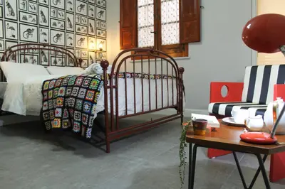 Letto o letti in una camera di Jacaranda