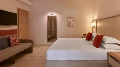 Letto o letti in una camera di Calaserena Resort