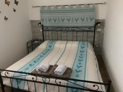 Letto o letti in una camera di La Piazzetta