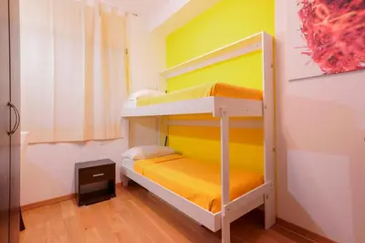 Letto o letti in una camera di Le Suite Sul Corso
