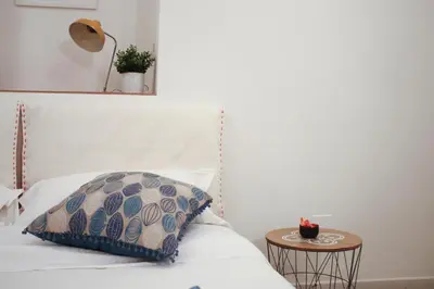 Letto o letti in una camera di Sa Prazza GuestHouse