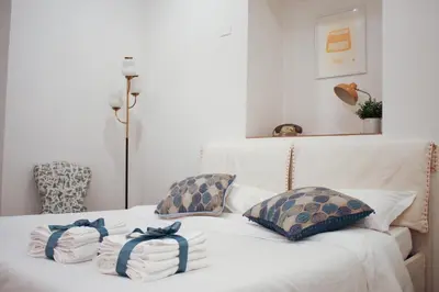 Letto o letti in una camera di Sa Prazza GuestHouse
