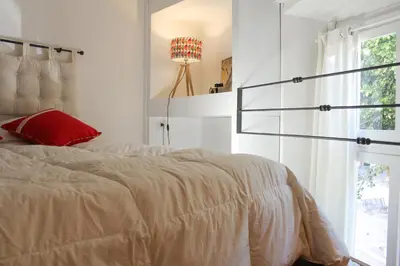 Letto o letti in una camera di Sa Prazza GuestHouse