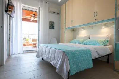 Letto o letti in una camera di La Terrazza Sul Parco