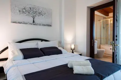 Letto o letti in una camera di La Terrazza Sul Parco