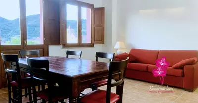 Area soggiorno di Residenza Locci - Rooms & Apartments