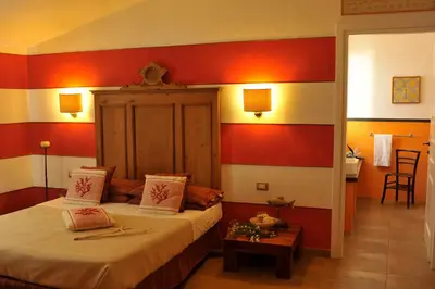 Letto o letti in una camera di Hotel Villa Pimpina