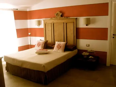 Letto o letti in una camera di Hotel Villa Pimpina