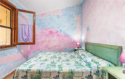 Letto o letti in una camera di Casa Glicine