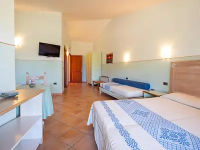 Letto o letti in una camera di Hotel Luci Del Faro