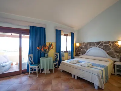 Letto o letti in una camera di Hotel Luci Del Faro