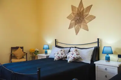 Letto o letti in una camera di B&B L'Albero Dei Limoni