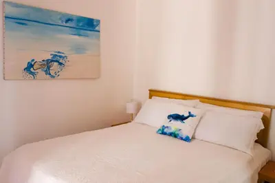 Letto o letti in una camera di Jungle House - Pineta Is Morus
