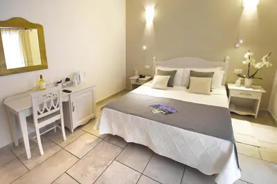 Letto o letti in una camera di Hotel I Graniti