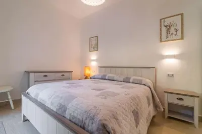 Letto o letti in una camera di Villa Oleandro