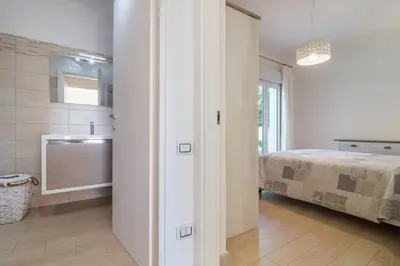 Letto o letti in una camera di Villa Oleandro