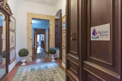 Certificato, attestato, insegna o altro documento esposto da Relais del Porto
