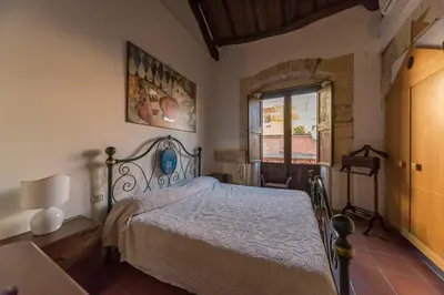 Letto o letti in una camera di Relais del Porto