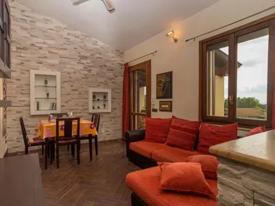 Area soggiorno di Apartment Appartamento Doria - REI186 by Interhome