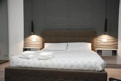 Letto o letti in una camera di Dolce Sbadiglio 2