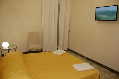 Letto o letti in una camera di Manzoni Suite