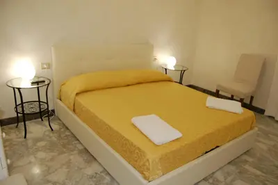 Letto o letti in una camera di Manzoni Suite