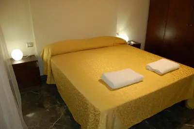 Letto o letti in una camera di Manzoni Suite