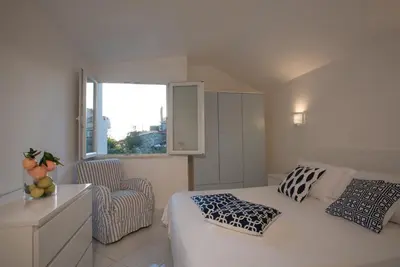 Letto o letti in una camera di Sul Mare Sardegna Villa Climene