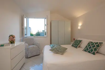 Letto o letti in una camera di Sul Mare Sardegna Villa Calliroe
