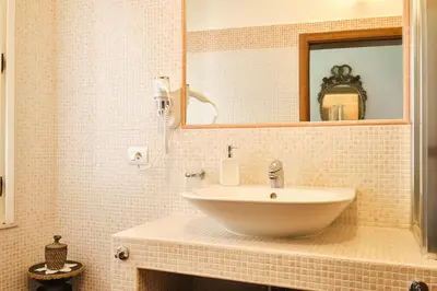 Bagno di La Villetta Adults Only con giardino a Pula