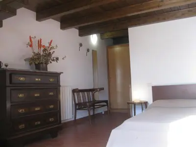 Letto o letti in una camera di B&B Sa Ingia