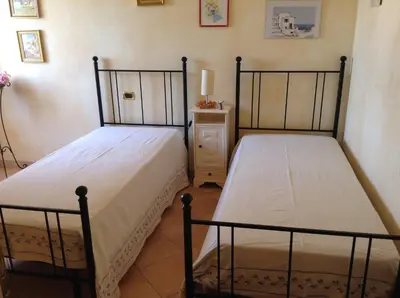 Letto o letti in una camera di Graziosissima villa