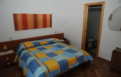 Letto o letti in una camera di Hotel California