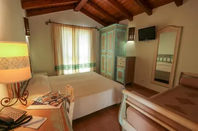 Letto o letti in una camera di Alma Resort