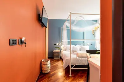Letto o letti in una camera di Il Panoramico Rooms