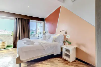 Letto o letti in una camera di Il Panoramico Rooms