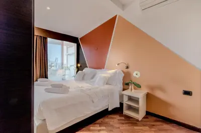 Letto o letti in una camera di Il Panoramico Rooms
