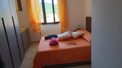 Letto o letti in una camera di Sole&Cuore
