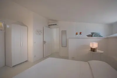 Letto o letti in una camera di Sul Mare Sardegna Villa Calipso