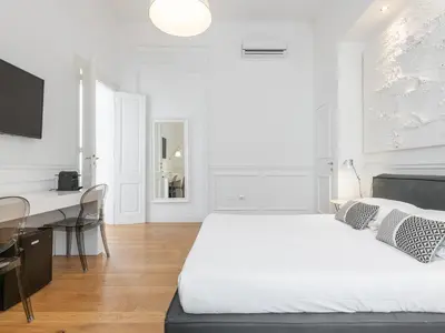 Letto o letti in una camera di PLEY Boutique Del Centro