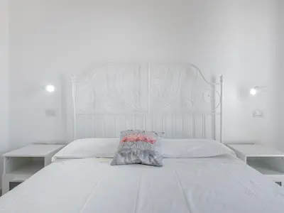 Letto o letti in una camera di Casa Nunzia