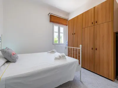 Letto o letti in una camera di Casa Nunzia